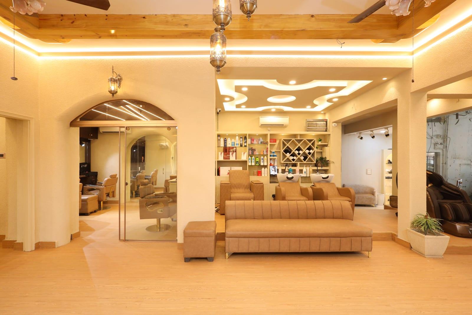 The lounge area at Rare Salon with product display shelves