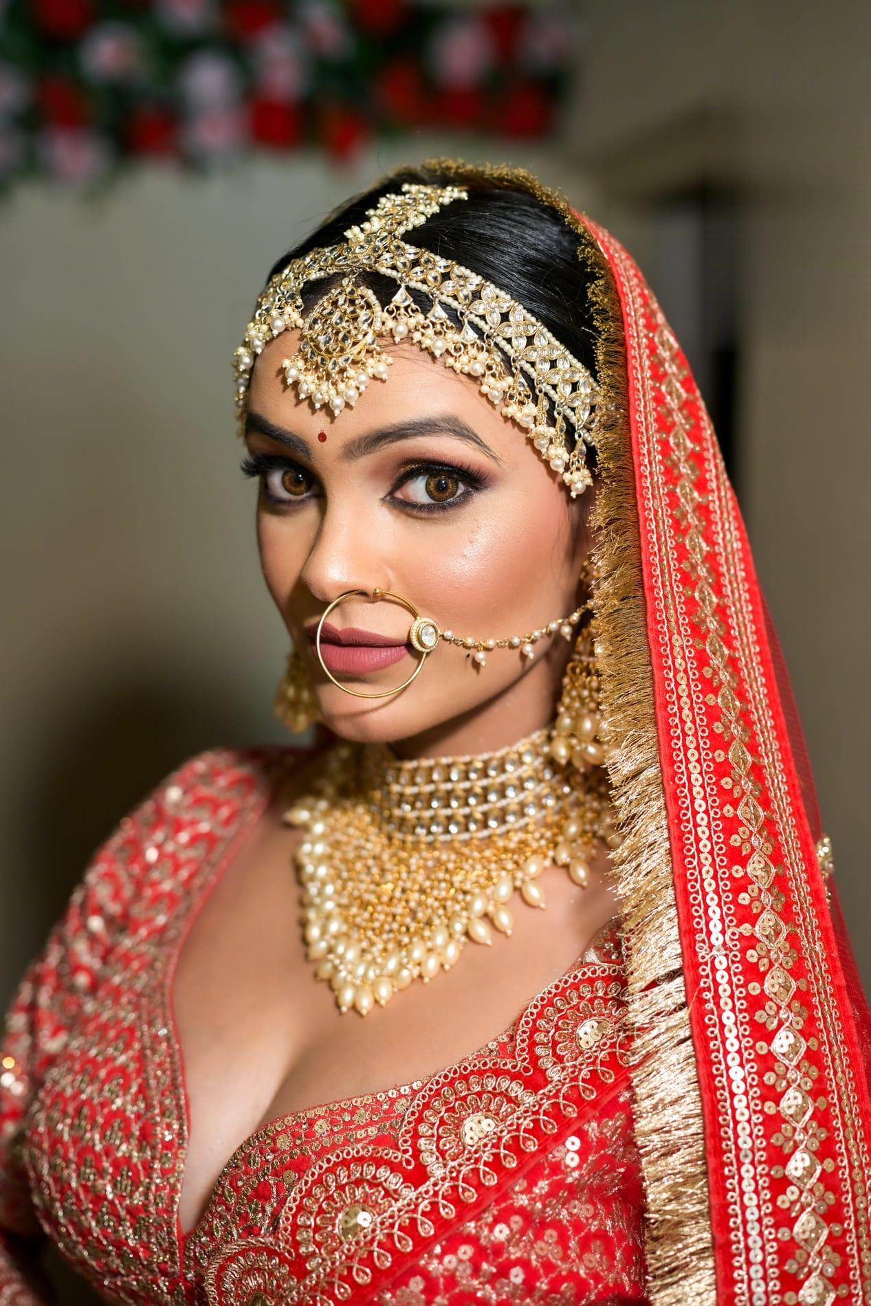 A Rare Salon bride in classic red bridal makeup, Dehradun