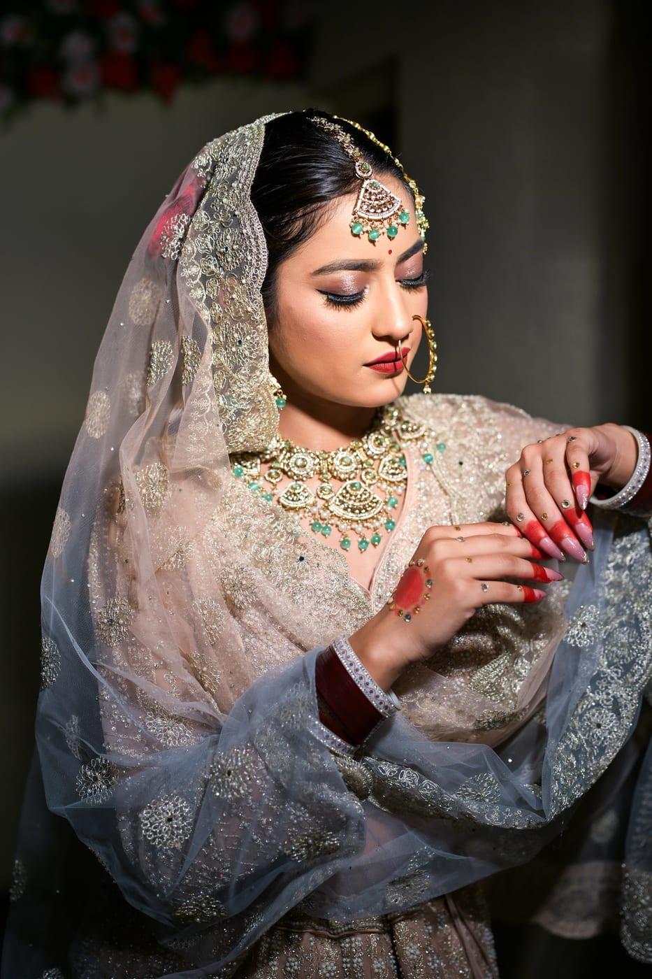 Soft glam bridal makeup with ivory and gold styling by Rare Salon