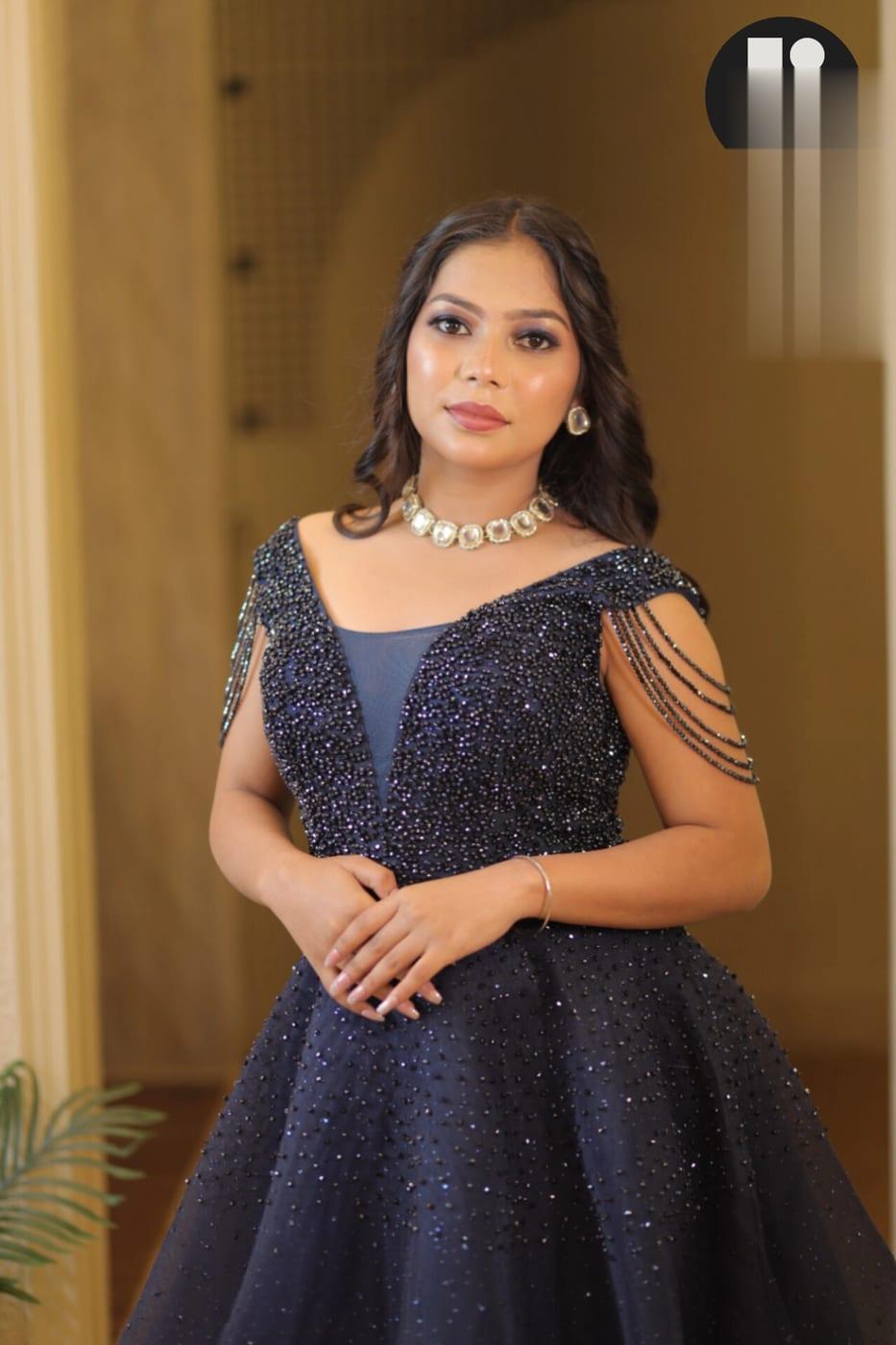 Reception party makeup in a navy gown by Rare Salon